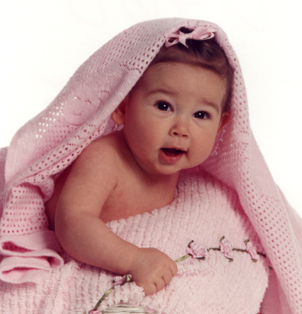 Baby Girl Under Pink Blanket