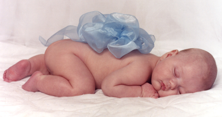 Baby Asleep with Blue Ruffle