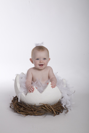 Happy Baby in Feathers