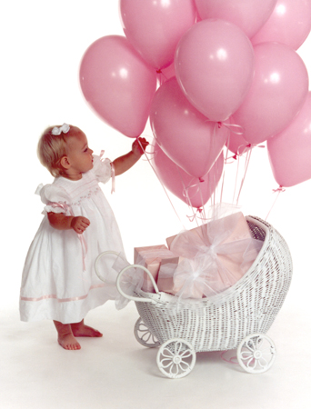 Toddler and Pink Balloons