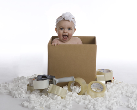 Baby in Cardboard Box