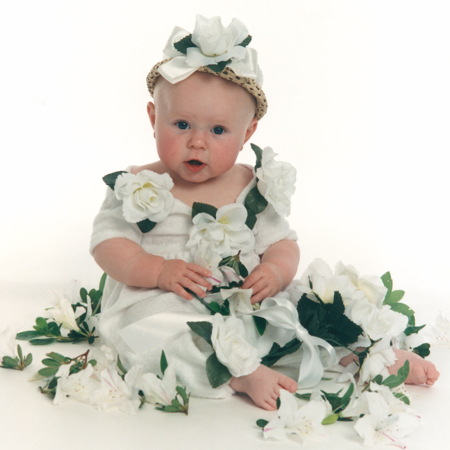 Baby With White Roses and Lilies