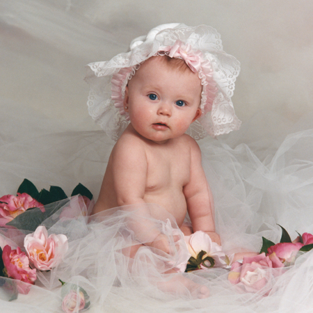 Baby in White Lace Bonnet