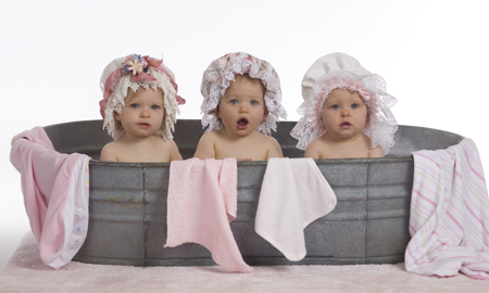 Three Toddlers in Flowery Bonnets