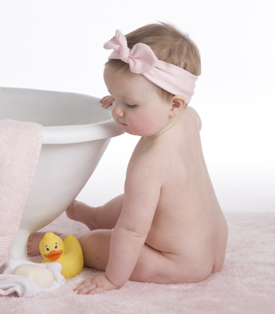 Baby with Pink Bow on Towel