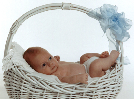 Baby Lying in Basket