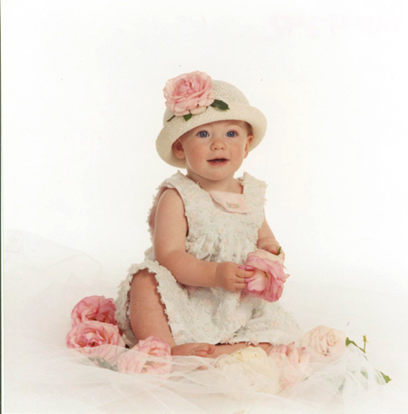 Baby Playing with Roses