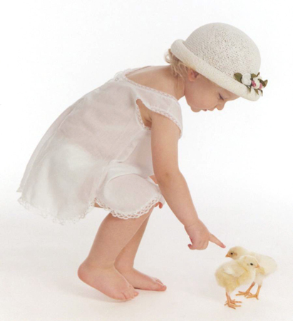 Toddler Playing With Easter Chicks