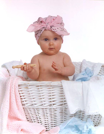 Baby in Washing Basket