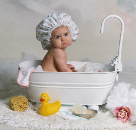 Baby in Old Metal Bath