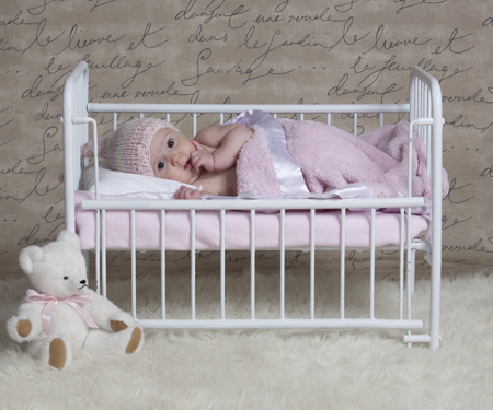 Toddler in Cot