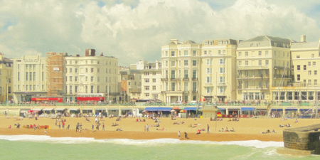 Brighton Seashore With Red Bus